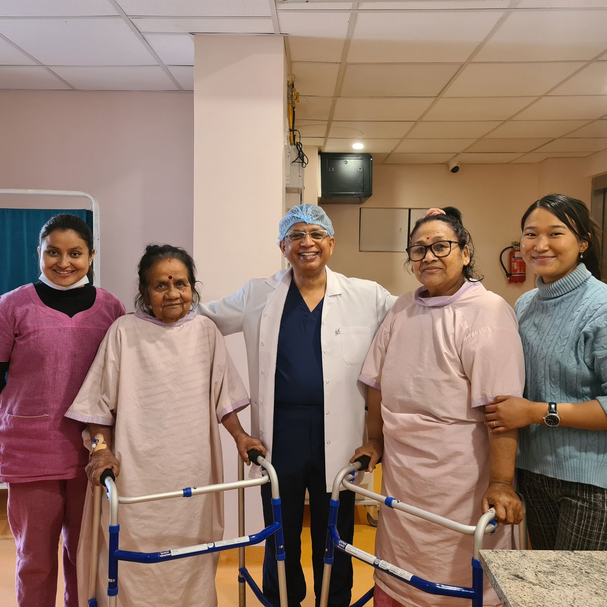 Dr. Chakra Raj Pandey with recovering patients and staff at Anamiwa Health
